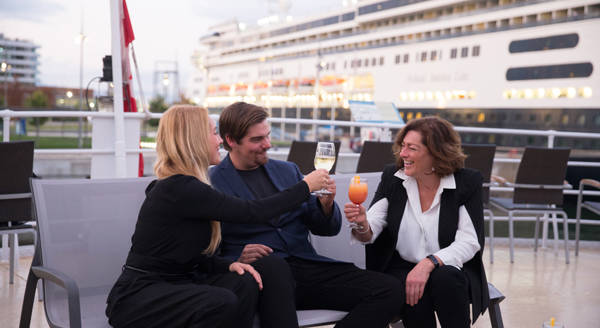 Friends doing a toast on the terrace