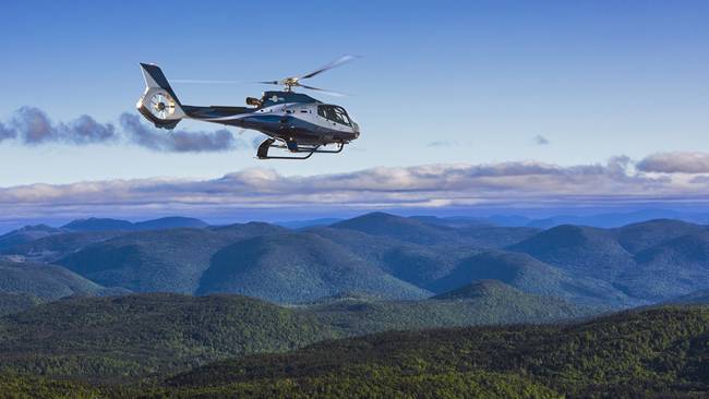  Helicopter overlooking mountains