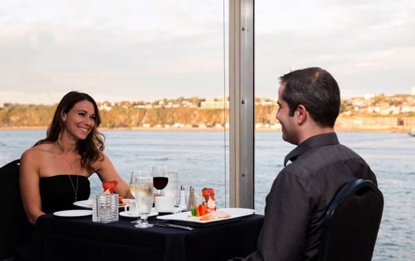  Couple enjoying a dinner aboard the AML Louis Jolliet