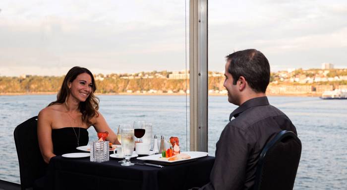  Couple enjoying a dinner aboard the AML Louis Jolliet